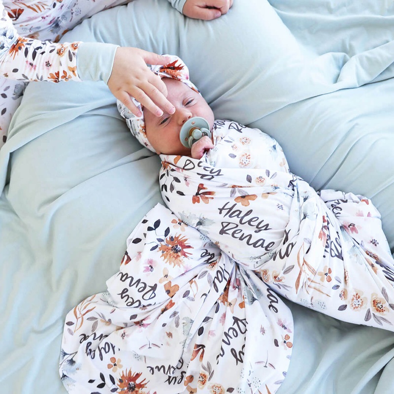 Lorelai’s Floral Personalized Baby Name Swaddle Blanket